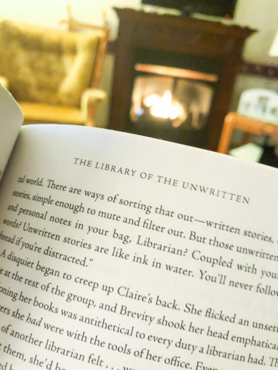 a book in frount of the fireplace